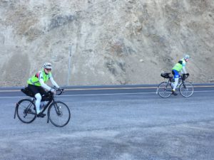 John and Ward cycling up White Pass