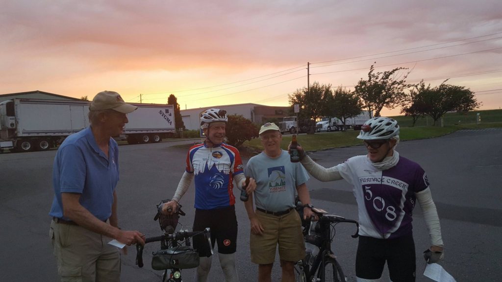 Pre-riders and support at sunset